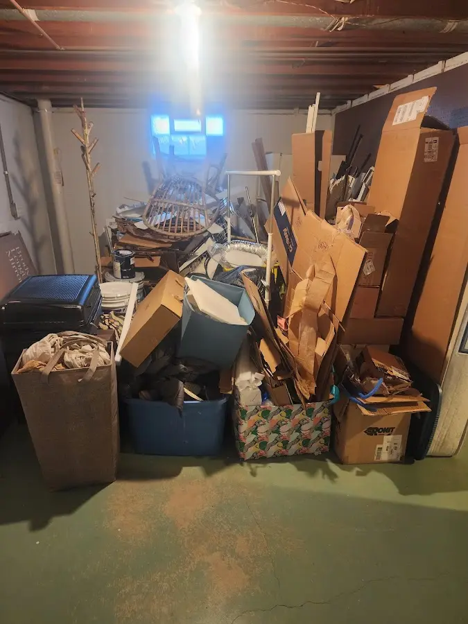 Roll-off dumpster container at job site for 20 Yard Dumpster Rental in Holly Springs